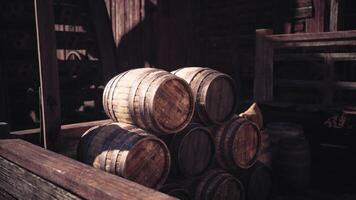CGI Stack of wooden barrels in a rustic warehouse during the afternoon light video