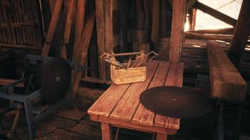 CGI Rustic workshop interior with tools and saws on a wooden table at sunset video