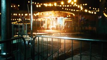 CGI Empty amusement park at night with glowing lights and silent rides video