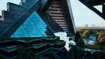 CGI Futuristic building with triangular glass facade in a vibrant urban setting video