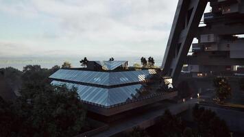 CGI Glass architecture surrounded by greenery at sunrise video