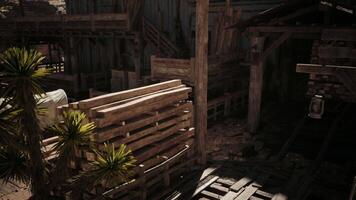 CGI Abandoned wooden structures amidst desert vegetation under bright sunlight video