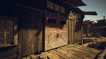 CGI Rustic wooden building in a deserted mining town during a bright afternoon video
