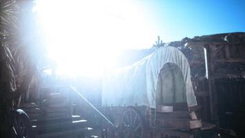 CGI Old wooden wagon under bright sunlight with steps leading up in the desert video