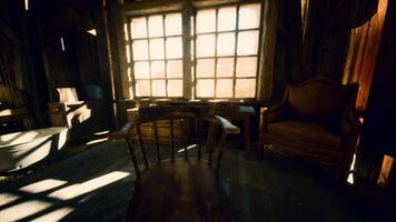 CGI Sunlight filters through dusty windows illuminating rustic interior space video