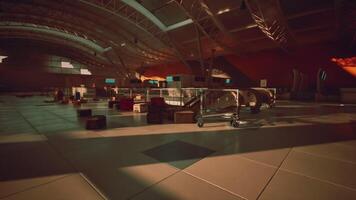 CGI Exploring an abandoned airport terminal with lost luggage and shadows video