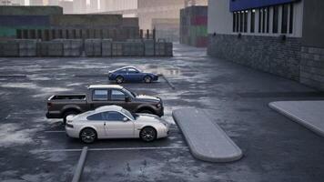 CGI Three parked cars along a wet urban street in an industrial area during daytime video