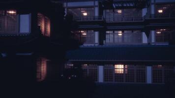 CGI Large traditional shogun residence illuminated at dusk in Japan video
