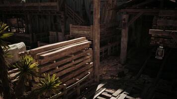 CGI Wooden pallets and structures in a rustic town during the daytime video