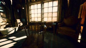 CGI Sunlight streams through dusty windows in an abandoned rustic cabin interior video