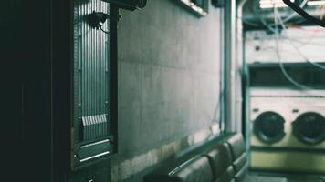 CGI Surveillance camera mounted in a dimly lit corridor near laundry facilities video