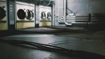 CGI Washing machines and a cable on the floor in a dimly lit laundry room video