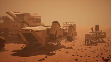 CGI Mars colony under construction with vehicles and habitats in view video