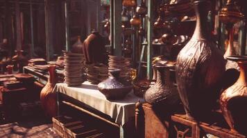 CGI Old market stalls filled with various pottery and decorative items in sunlight video