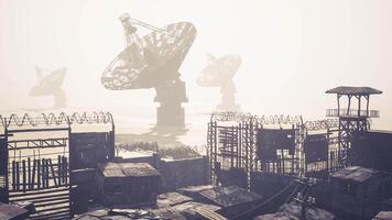 CGI Abandoned satellite dishes in a foggy landscape near ruins video