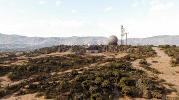 CGI Remote mountain facility with satellite dishes and communication towers video
