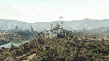 CGI Ancient structure on rocky hilltop with distant mountains and a river video