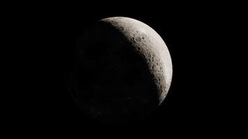 CGI Moon in crescent phase illuminated against dark night sky video