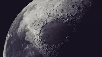 CGI Exploring the detailed surface of the moon during a clear night sky video