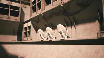 CGI Satellite dishes mounted on a weathered building in a dimly lit urban area video