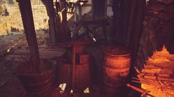 CGI Crafting tools in an old forge during the golden hour light of sunset video
