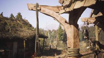 CGI Rustic wooden structure with rope hanging in a peaceful countryside setting video