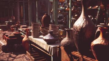 CGI Beautiful pottery and ceramics displayed in a vibrant market setting video