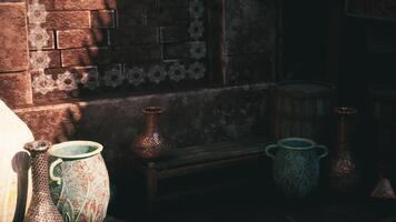 CGI Artistic arrangement of pottery in a rustic indoor setting at sunset video