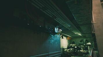 CGI Unused industrial corridor with pipes and dim lighting in a urban setting video