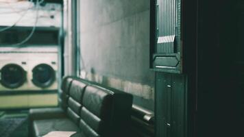 CGI Nostalgic waiting area in a vintage laundromat with a classic feel video
