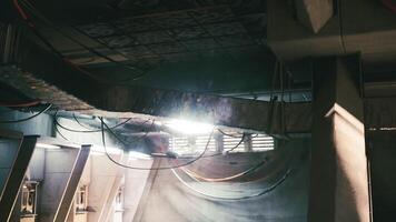 CGI Industrial setting with cables and sunlight filtering through structures video