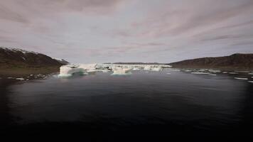 CGI Majestic icebergs floating in Greenlands serene waters during daylight video