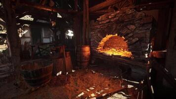 CGI Crafting tools in an old forge with warm glow from the hearth video
