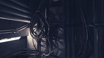CGI Complex network of cables in a dimly lit industrial environment video