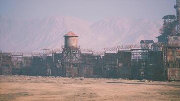 CGI Desert landscape featuring a rusted industrial complex surrounded by mountains video