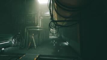 CGI Dimly lit industrial corridor with pipes and cables in a warehouse setting video