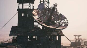 CGI Communication array atop a dilapidated structure in a remote location video
