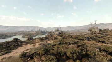CGI Distant view of a rugged landscape with communication towers and a lake video