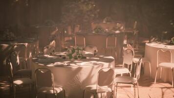 CGI Outdoor wedding reception setup with elegant tables and decorations in sunlight video