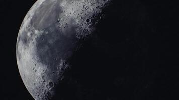 CGI Moon in its crescent phase with detailed craters illuminated by sunlight video