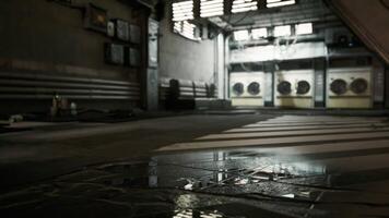 CGI Abandoned urban laundry space with reflections on wet floor video