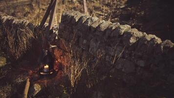 CGI Lantern glowing by an ancient stone wall in a serene outdoor setting video