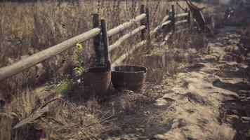 CGI Rustic scene with wooden fence and baskets in a dry field video