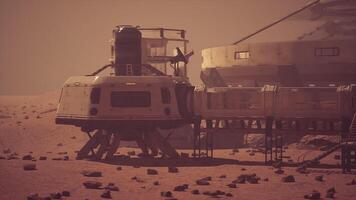 CGI Mars colony habitats under a dusty atmosphere during sunset hours video