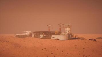 CGI Mars colony structures amidst the dusty red landscape at sunset video