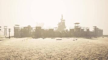 CGI Deserted wooden structure stands alone in arid landscape at sunset video