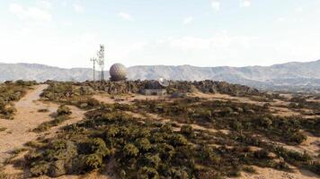 CGI Remote mountain site with radar and communication towers in blue sky video
