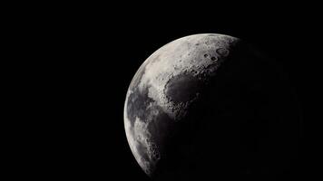 CGI Moon illuminated by sunlight showcasing surface craters and details video
