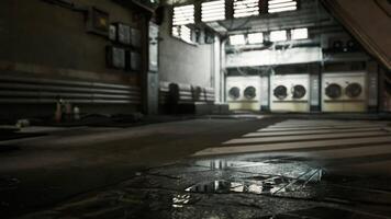 CGI Abandoned industrial space with reflections on wet floor in urban setting video