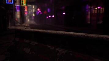 CGI Misty urban street illuminated by neon lights during nighttime hours video